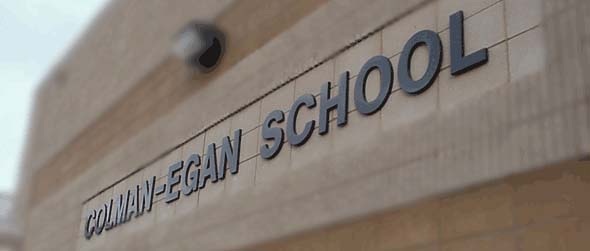 Front of school building title as Colman-Egan school